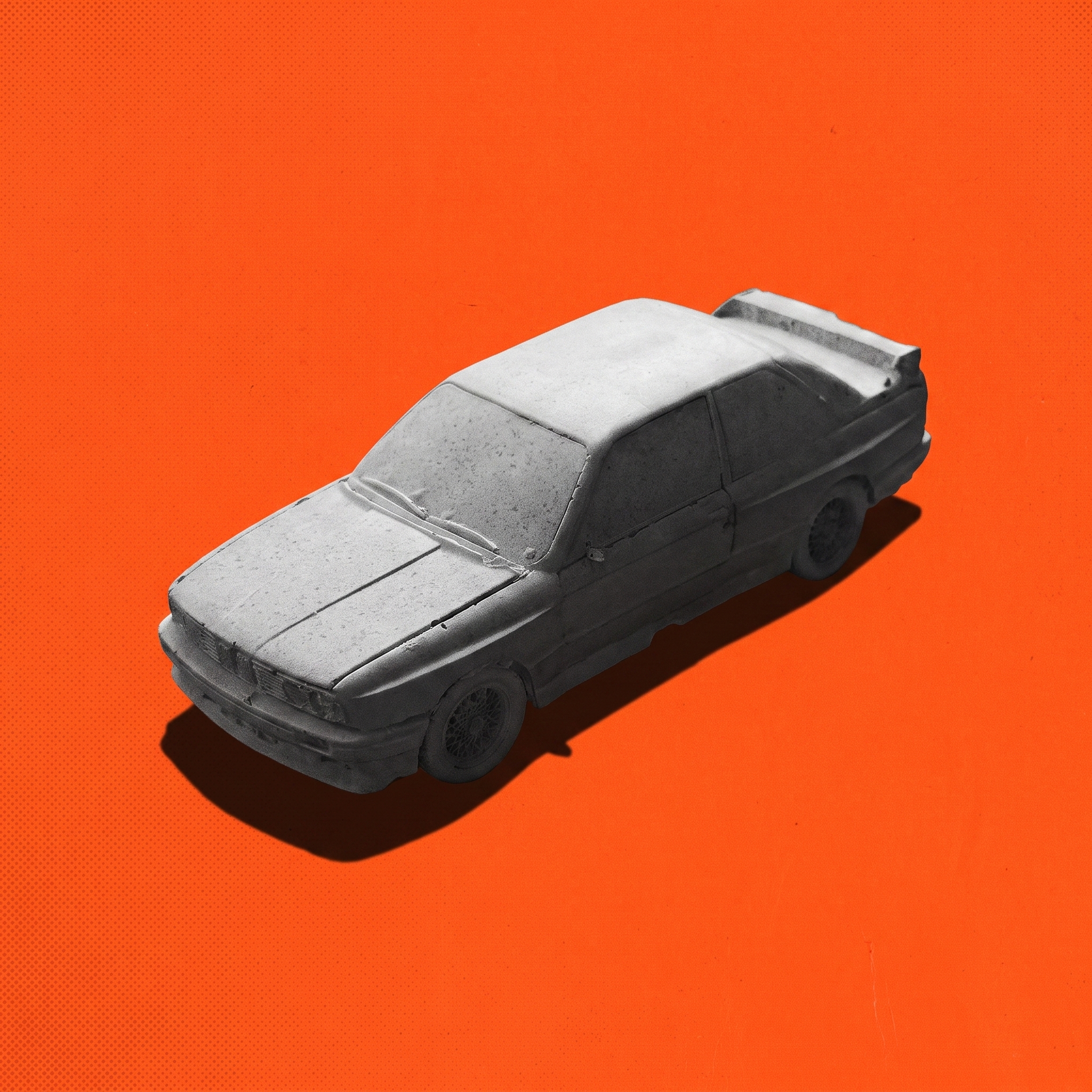 No. 002 Raw — the actual concrete saloon, front three-quarter, on a hazard-orange field